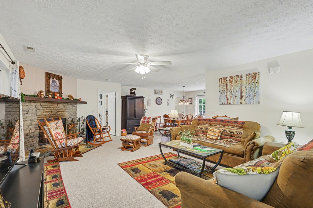 4790 Fires Creek Road Hayesville, NC 28904 - Photo 38 of 61 a living room with furniture kitchen view and a window