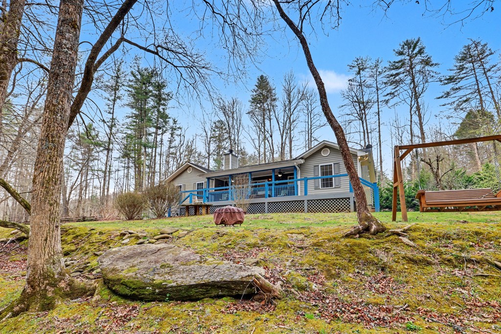 4790 Fires Creek Road Hayesville, NC 28904 - Photo 50 of 61 a view of a house with a yard covered in snow