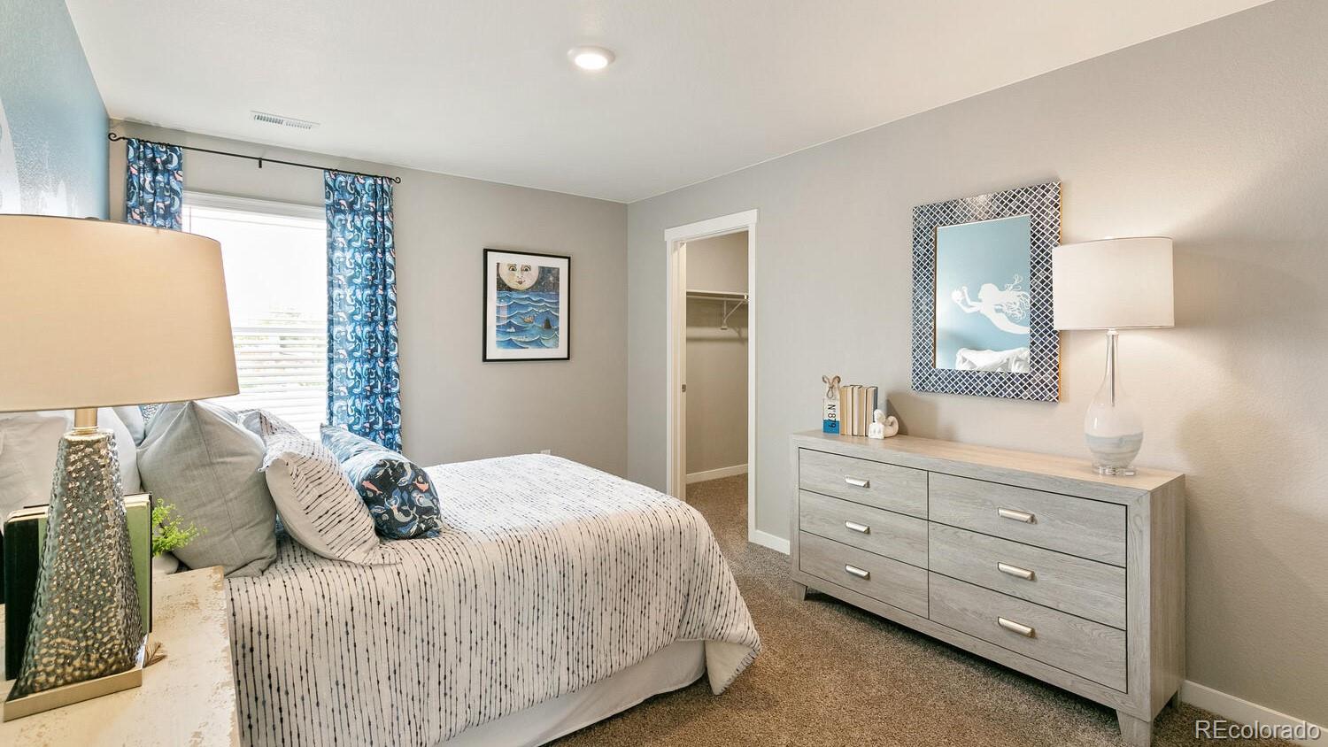 3466 Belleville Ridge Road Elizabeth, CO 80107 - Photo 19 of 24 a bedroom with a bed and a window