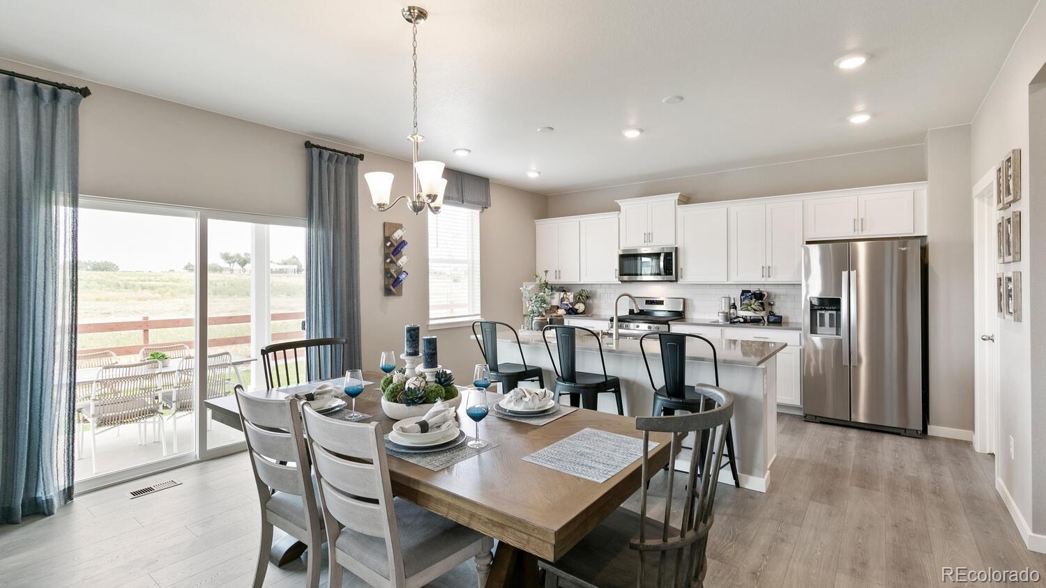 3466 Belleville Ridge Road Elizabeth, CO 80107 - Photo 7 of 24 a view of a dining room and livingroom view