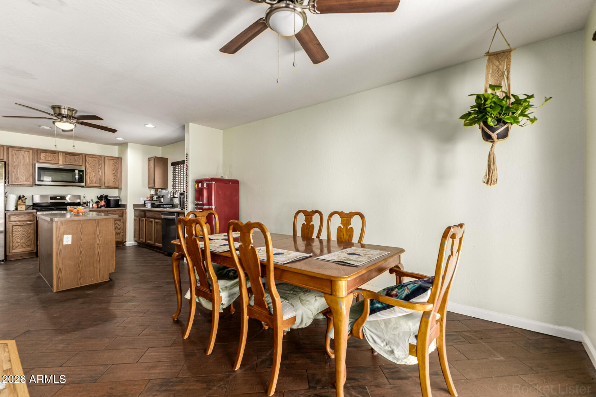 40264 West Lococo Street Maricopa, AZ 85138 - Photo 26 of 29 a dining room with furniture and window
