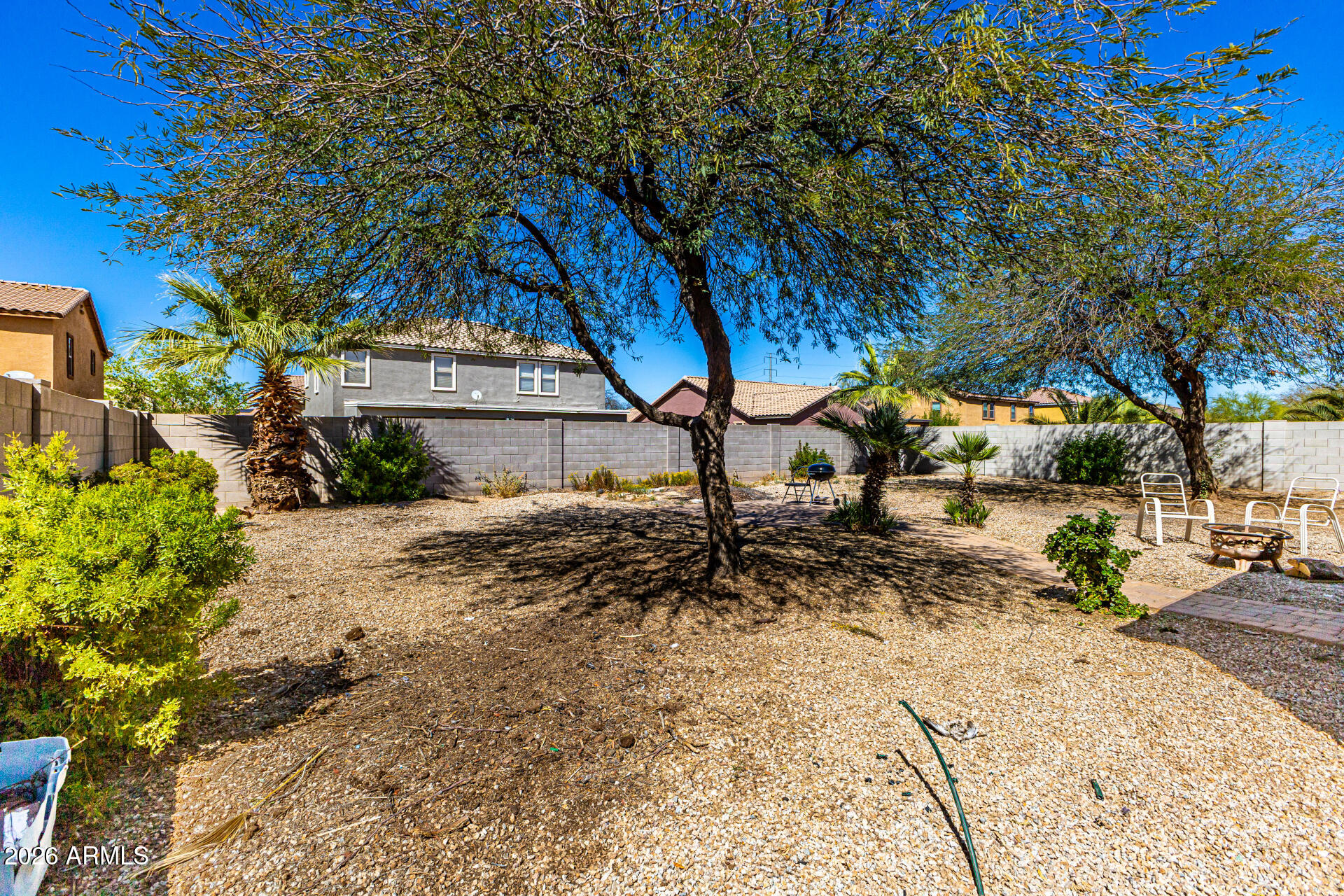 40264 West Lococo Street Maricopa, AZ 85138 - Photo 9 of 29 a view of a park with large trees