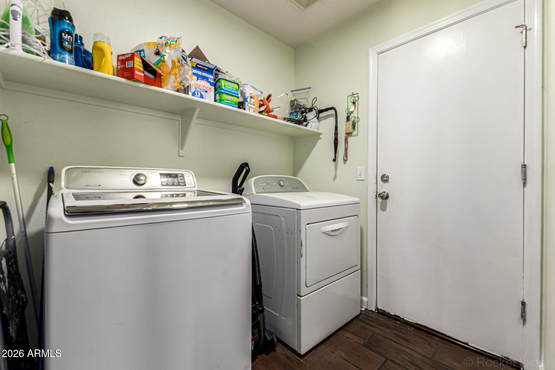 40264 West Lococo Street Maricopa, AZ 85138 - Photo 10 of 29 a utility room with dryer and washer