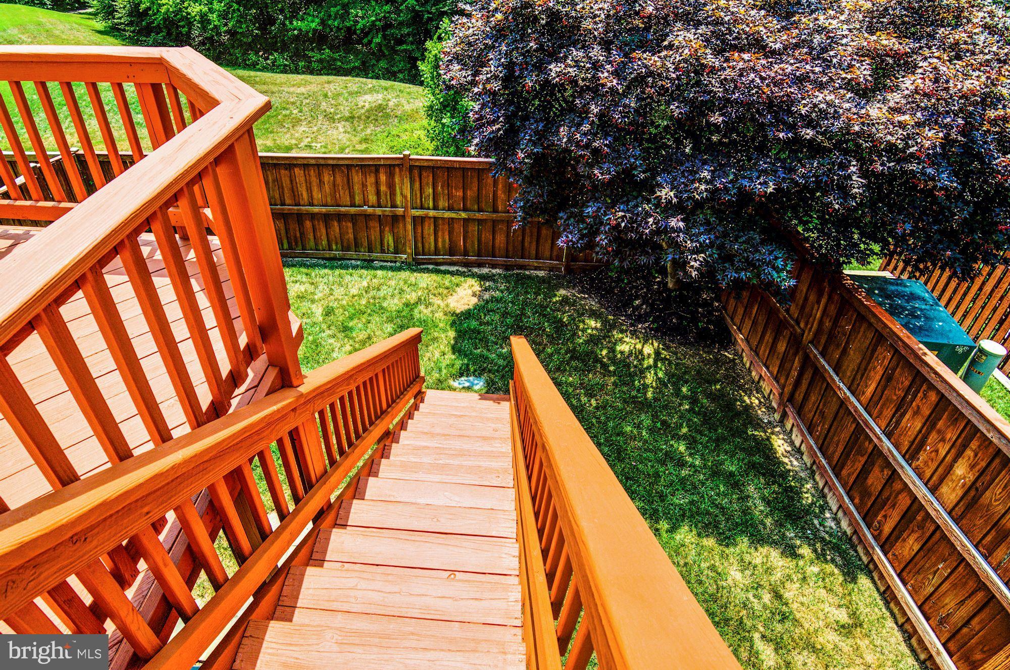 8720 Wadebrook Terrace Springfield, VA 22153 - Photo 28 of 33 Walk from deck to fully-fenced backyard
