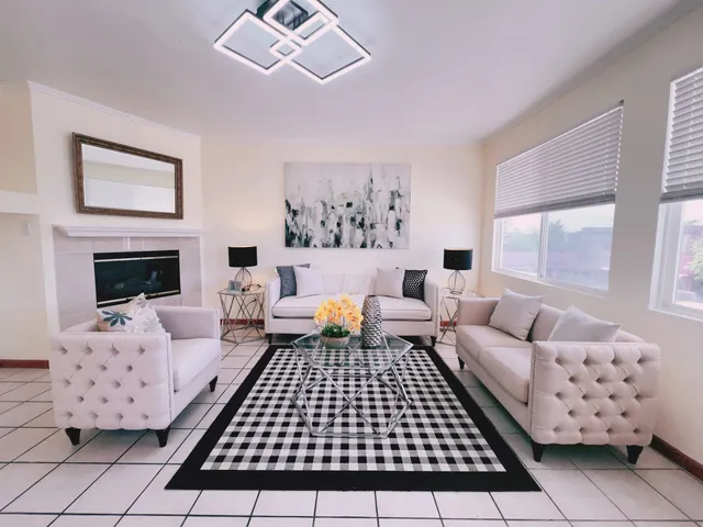 a living room with furniture and a window