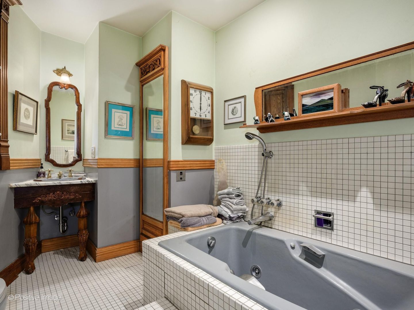 33 East Division Street Chicago, IL 60611 - Photo 12 of 34 a bathroom with a sink and a mirror