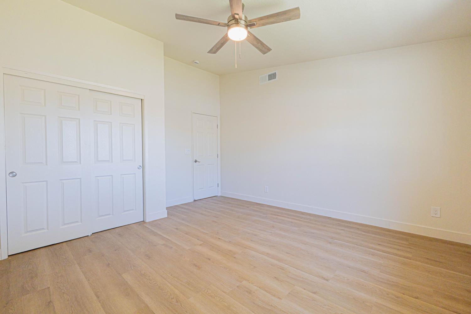17925 Rodeo Drive Madera, CA 93638 - Photo 11 of 26 wooden floor in an empty room