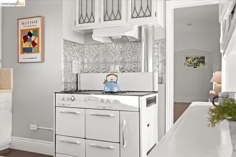 a spacious bedroom with a bed and a couch