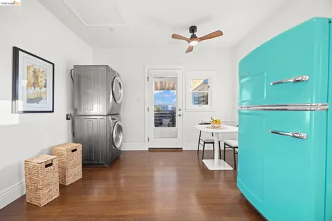 a bedroom with a bed and a potted plant