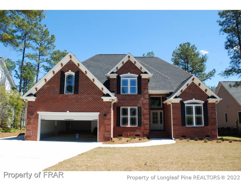 270 Falling Water Road Spring Lake, NC 28390 - Photo 1 of 34 a front view of a house with a yard