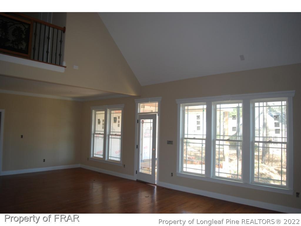 270 Falling Water Road Spring Lake, NC 28390 - Photo 15 of 34 a view interior of a house with wooden floor and windows