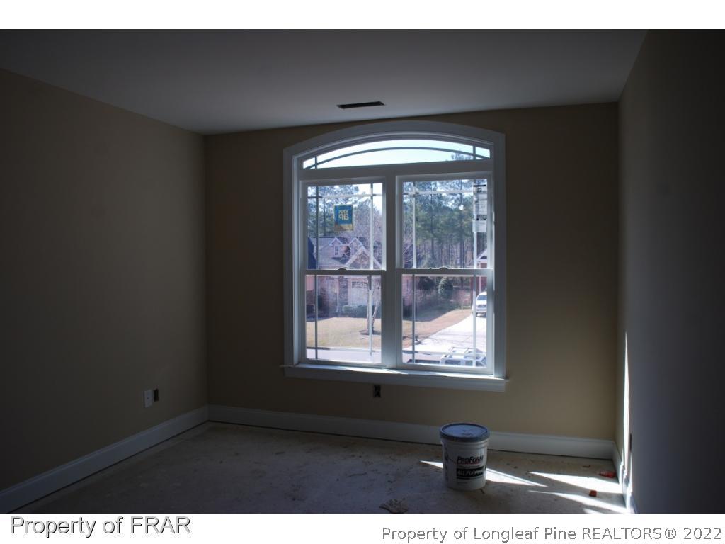 270 Falling Water Road Spring Lake, NC 28390 - Photo 18 of 34 a view of an empty room with a window