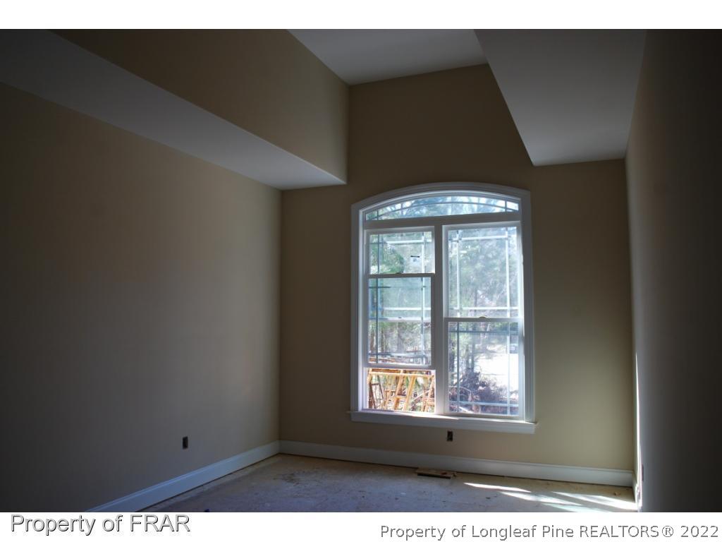 270 Falling Water Road Spring Lake, NC 28390 - Photo 9 of 34 a view of an empty room with a window