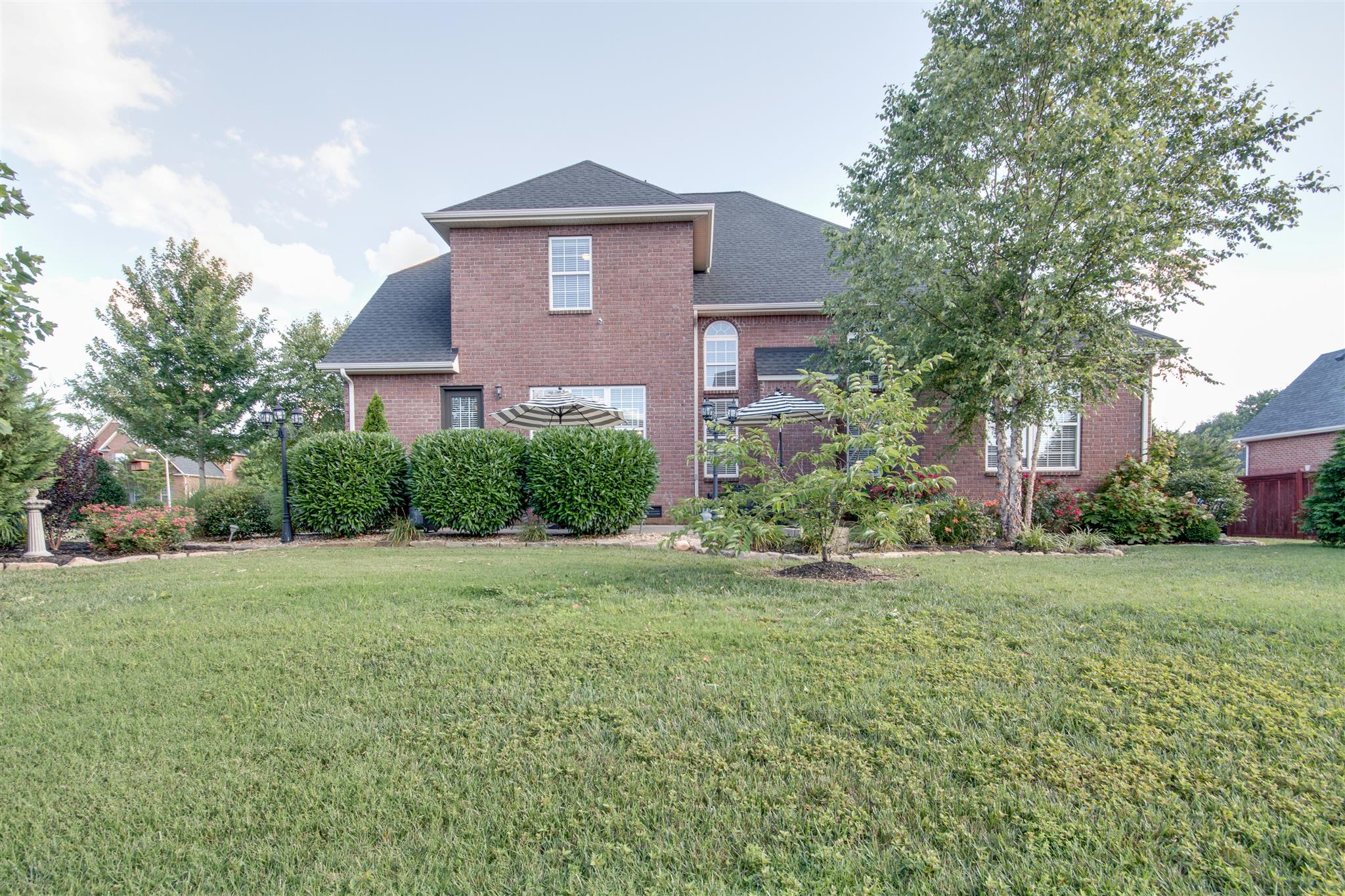 453 Savannah Ridge Murfreesboro, TN 37127 - Photo 28 of 29 Back view of home! Landscaping provides some privacy for the patio area