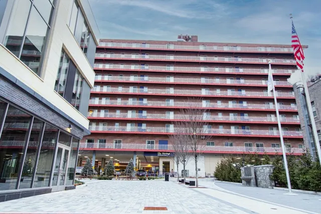 a front view of a building with street