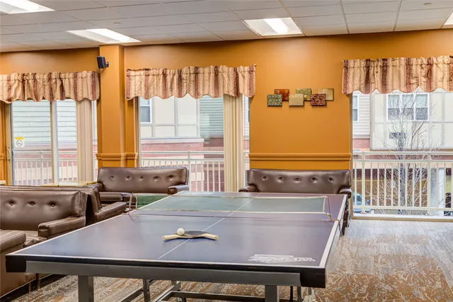 a view of kitchen with furniture and window