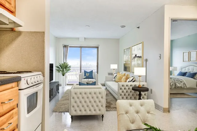 a living room with furniture and a table