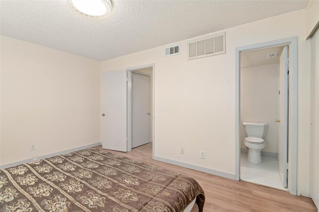 700 West Collins Street Denton, TX 76201 - Photo 23 of 36 Primary bedroom with access to the upstairs bathroom