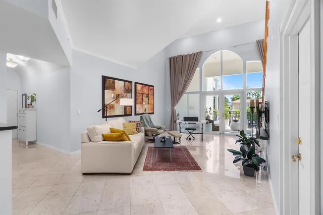 a workspace with wooden floor and furniture