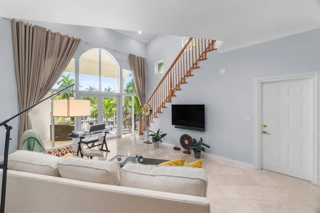 a group of people sitting in a living room