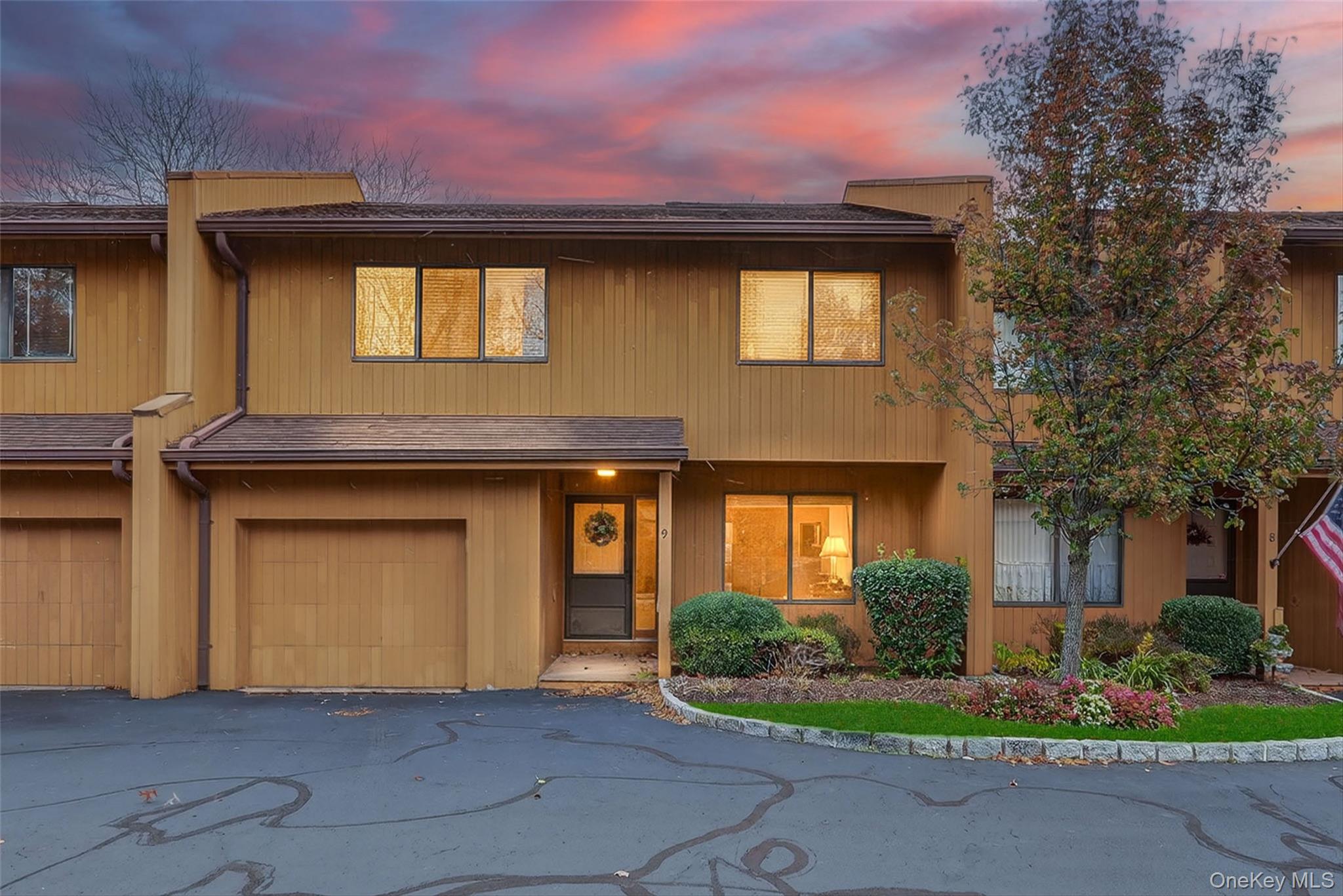 200 California Road, Unit 9 Mount Vernon, NY 10552 - Photo 1 of 50 a front view of a house with a garden