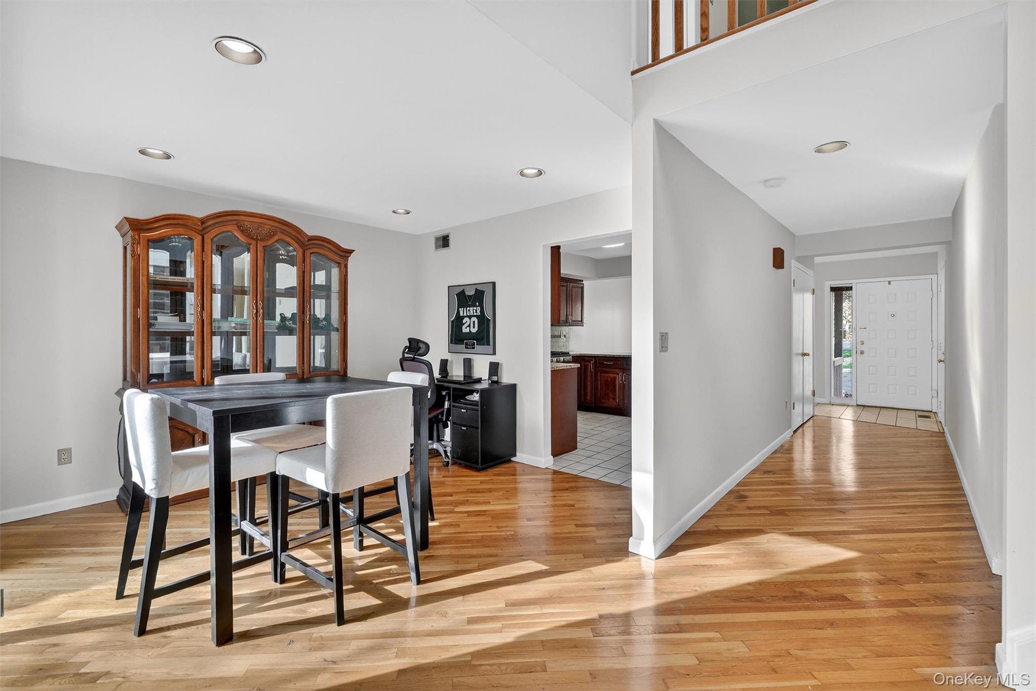 200 California Road, Unit 9 Mount Vernon, NY 10552 - Photo 14 of 50 a view of a dining room with furniture and wooden floor