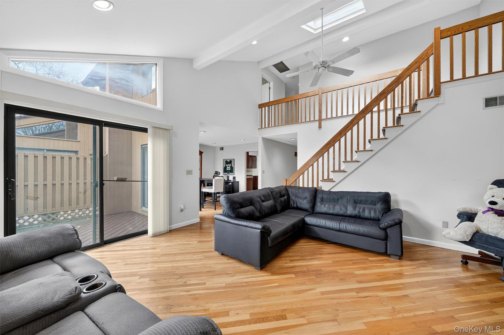 200 California Road, Unit 9 Mount Vernon, NY 10552 - Photo 19 of 50 a living room with furniture and stairs