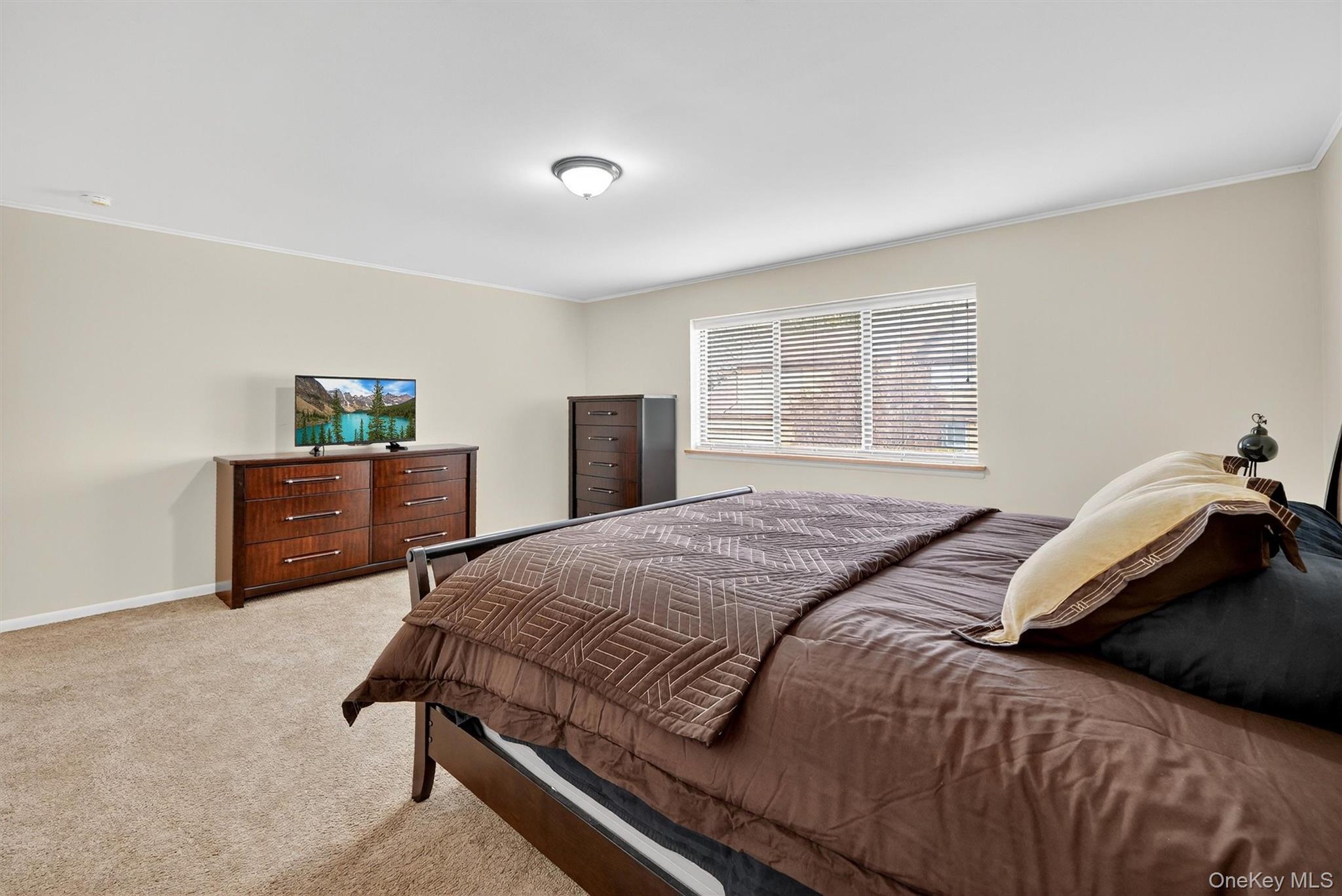 200 California Road, Unit 9 Mount Vernon, NY 10552 - Photo 26 of 50 a bedroom with a bed and a window