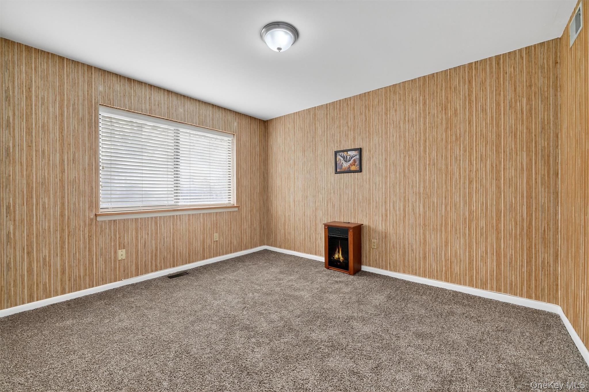 200 California Road, Unit 9 Mount Vernon, NY 10552 - Photo 33 of 50 an empty room with windows