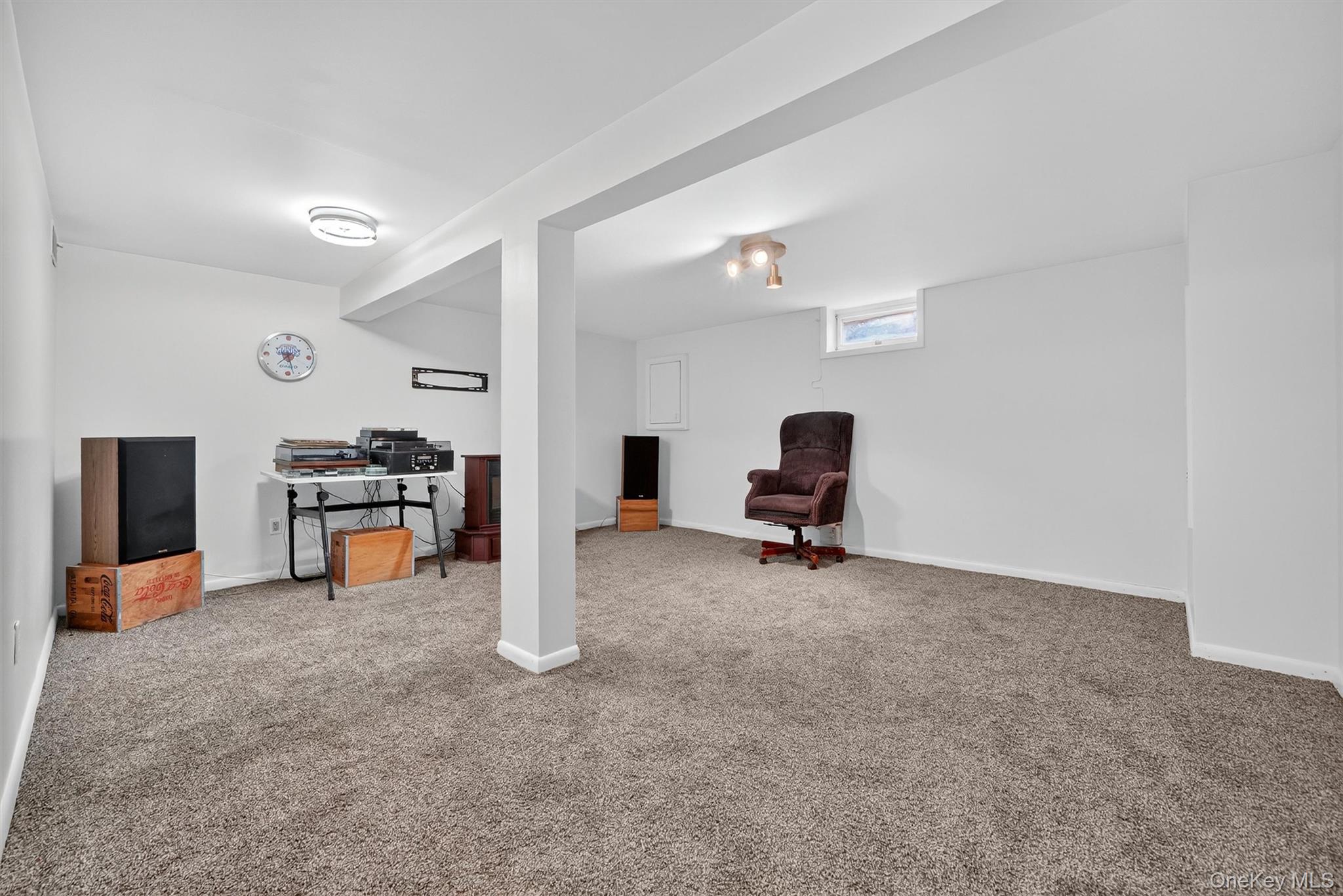 200 California Road, Unit 9 Mount Vernon, NY 10552 - Photo 36 of 50 a view of a livingroom with furniture and a fireplace