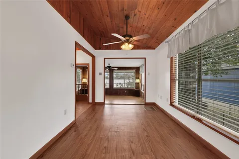 a view of an entryway with wooden floor