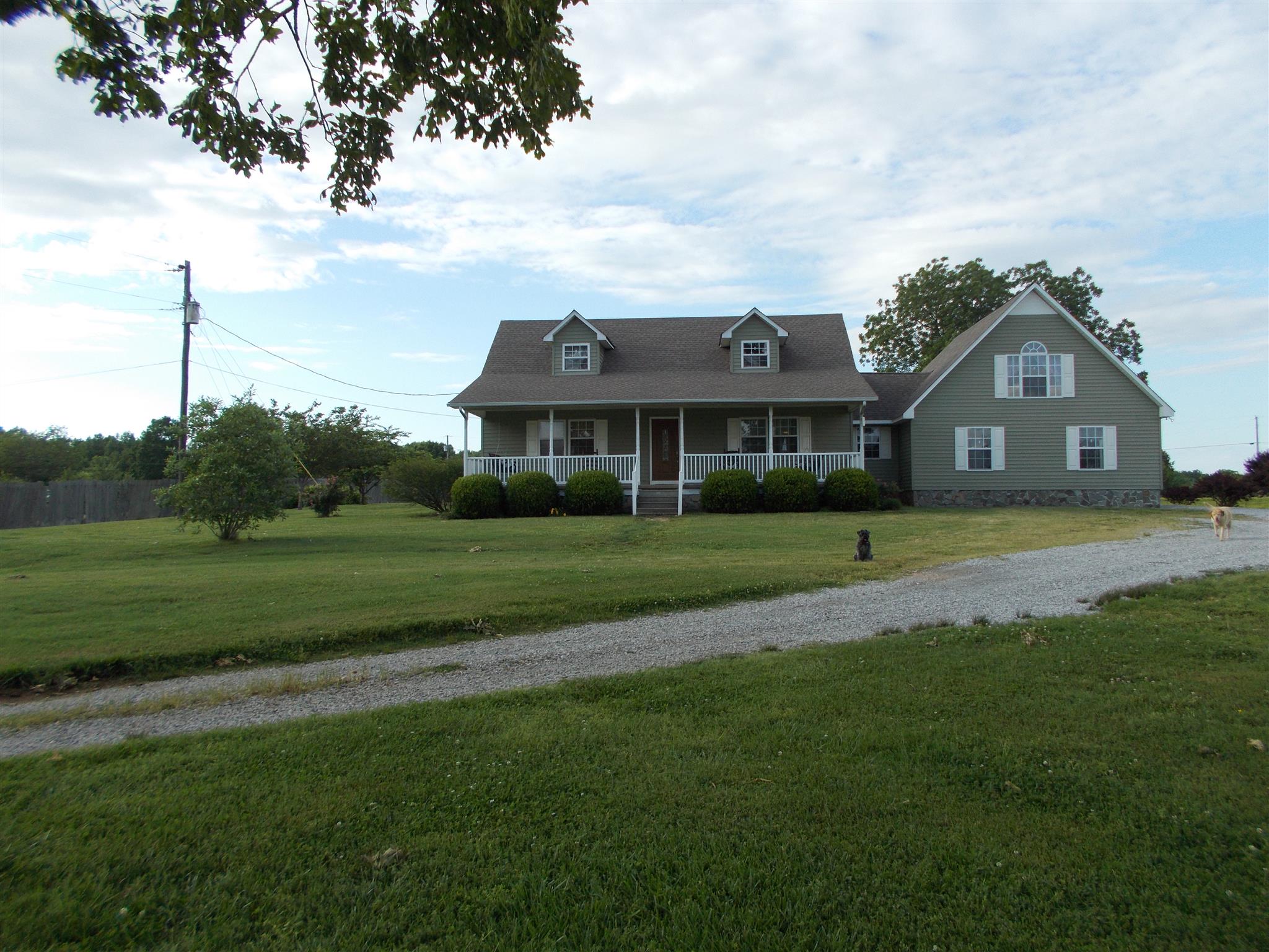 136 Westside Road Lawrenceburg, TN 38464 - Photo 1 of 30 a front view of a house with a yard