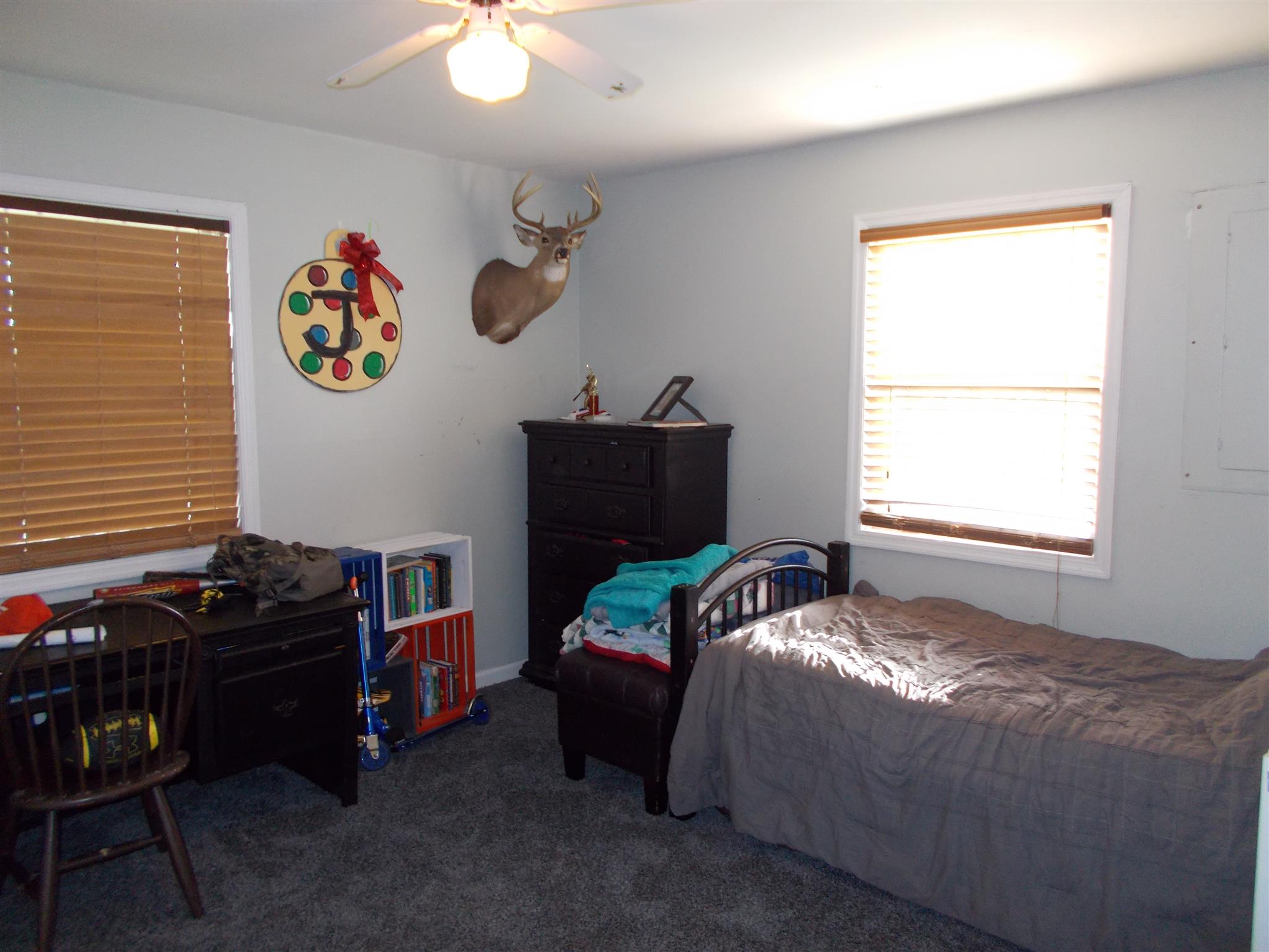 136 Westside Road Lawrenceburg, TN 38464 - Photo 11 of 30 a bedroom with a bed and a window