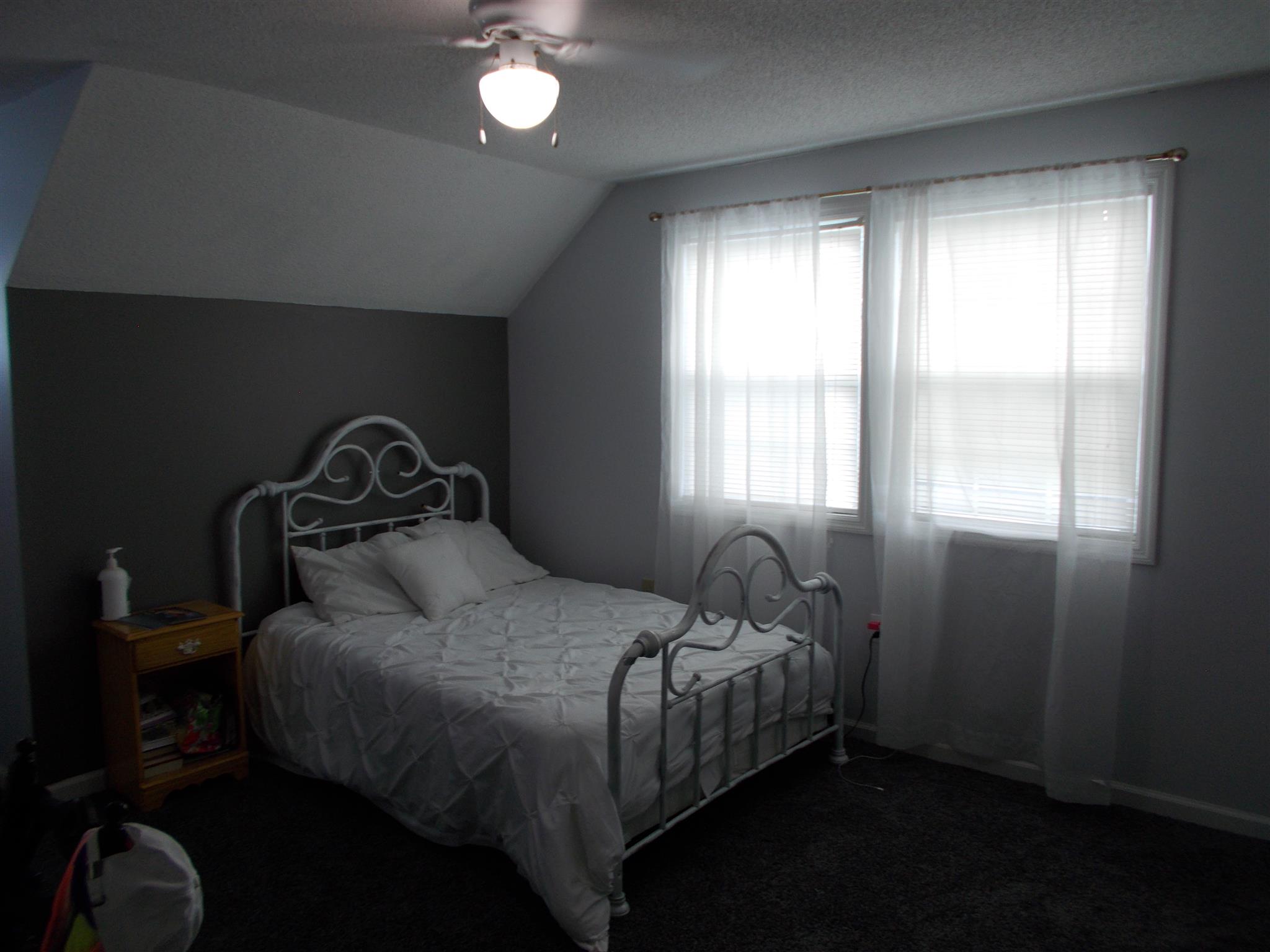 136 Westside Road Lawrenceburg, TN 38464 - Photo 14 of 30 a bedroom with a bed and window