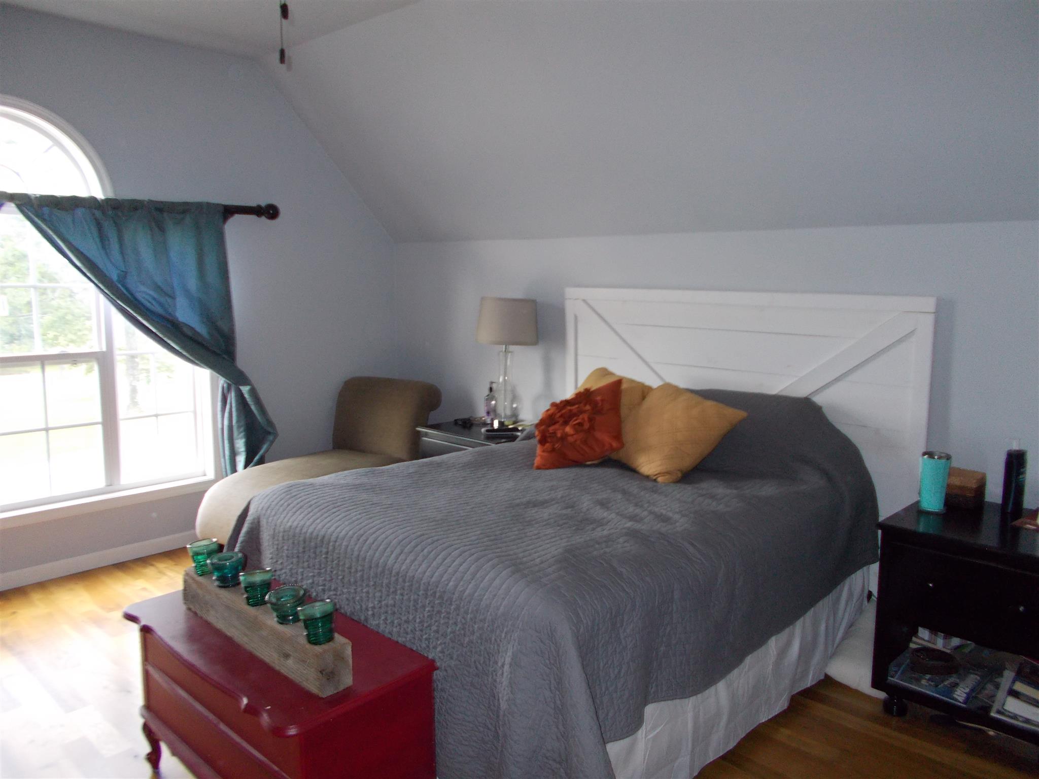 136 Westside Road Lawrenceburg, TN 38464 - Photo 21 of 30 a bedroom with a bed and window