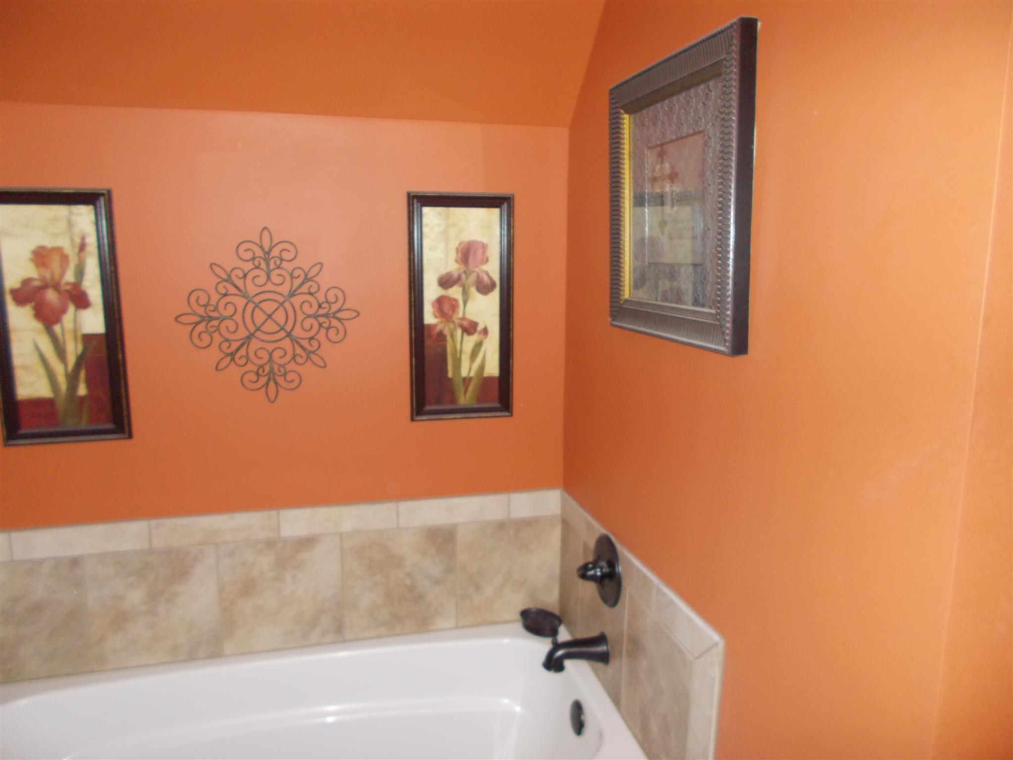 136 Westside Road Lawrenceburg, TN 38464 - Photo 25 of 30 a bathroom with a bathtub and shower