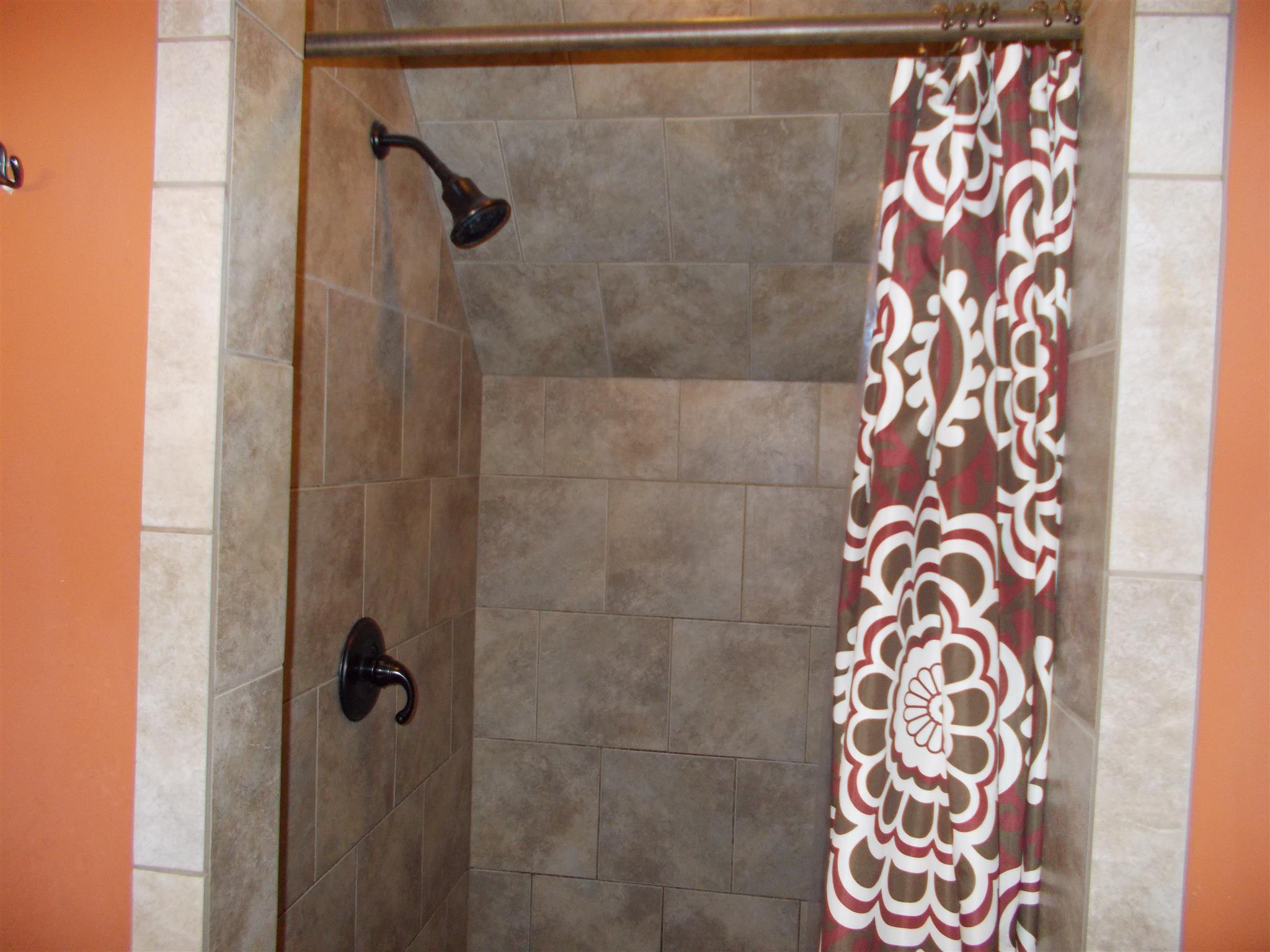 136 Westside Road Lawrenceburg, TN 38464 - Photo 27 of 30 a bathroom with a shower and a sink