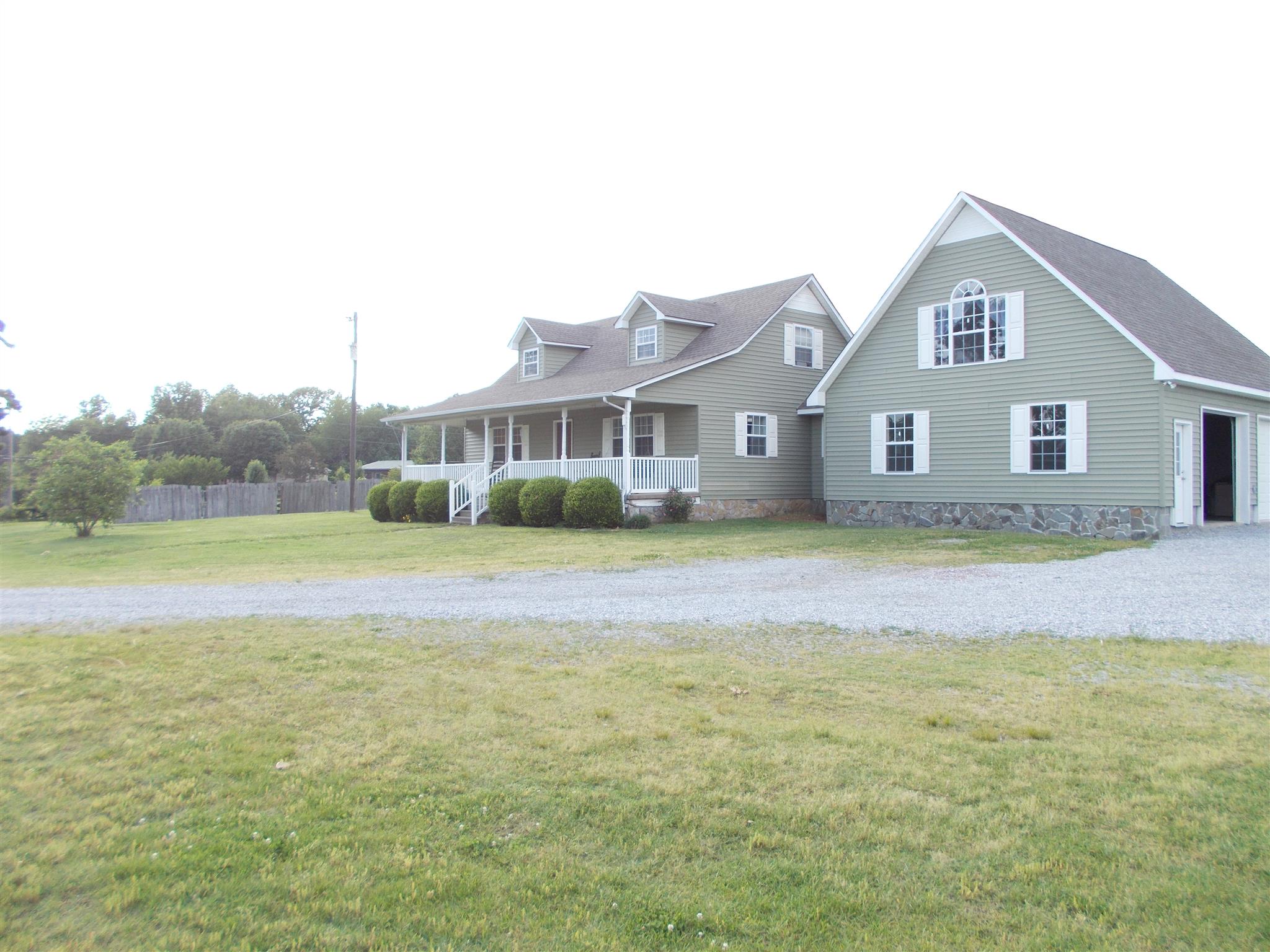 136 Westside Road Lawrenceburg, TN 38464 - Photo 30 of 30 a front view of a house with garden