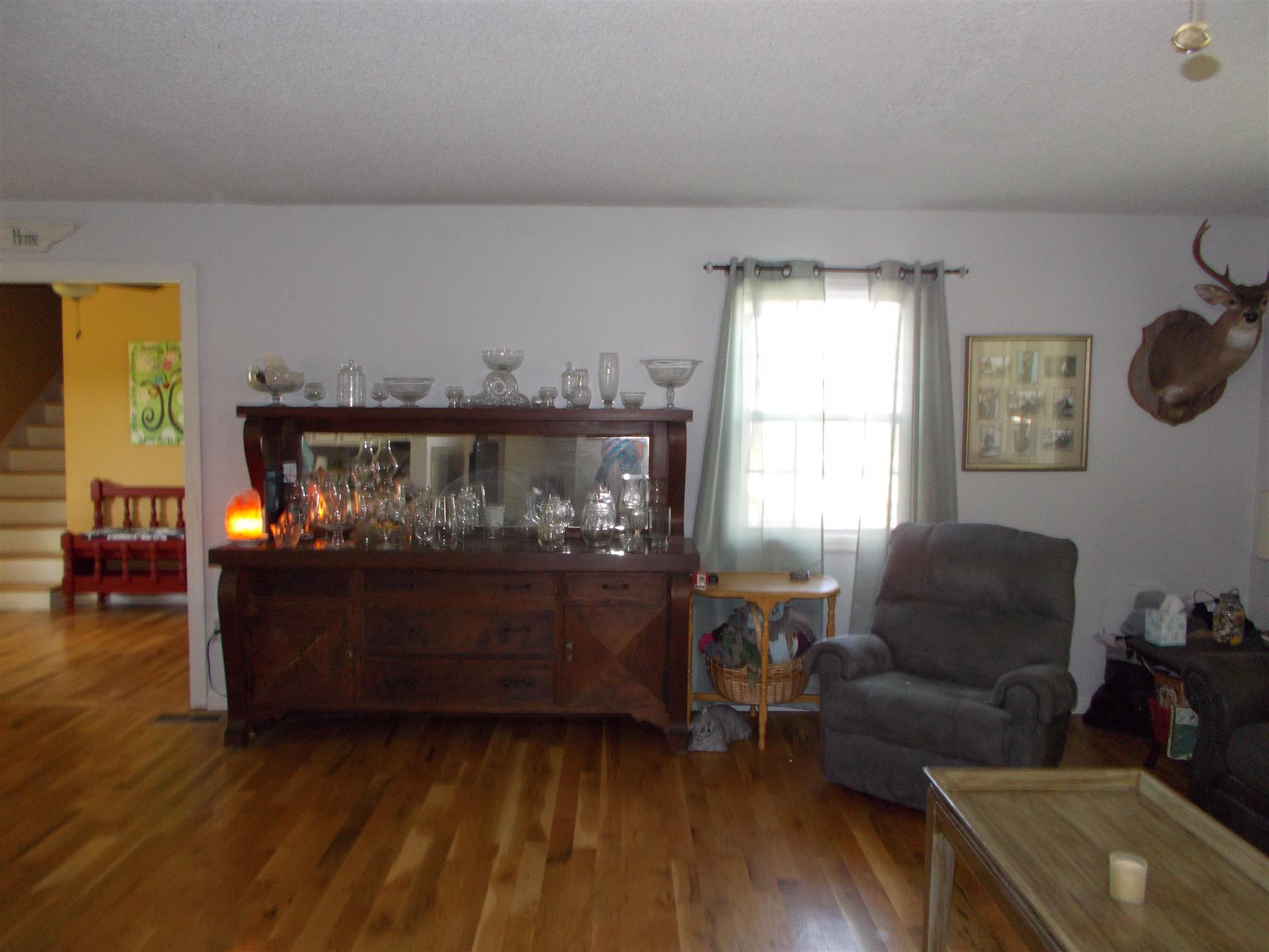 136 Westside Road Lawrenceburg, TN 38464 - Photo 10 of 30 a living room with furniture and a fireplace
