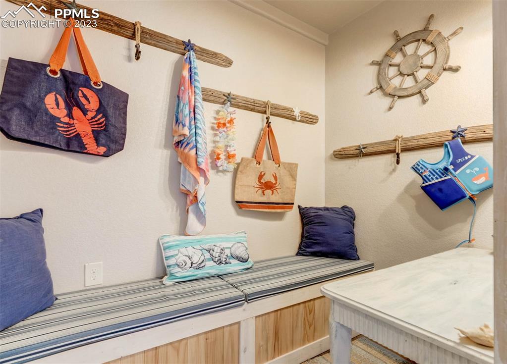 17305 Goshawk Road Colorado Springs, CO 80908 - Photo 15 of 50 a view of wooden floor and a potted plant on the counter