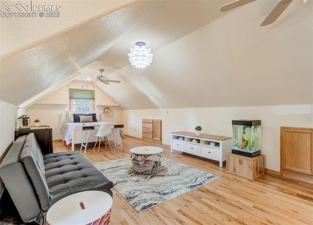 17305 Goshawk Road Colorado Springs, CO 80908 - Photo 37 of 50 a living room with furniture