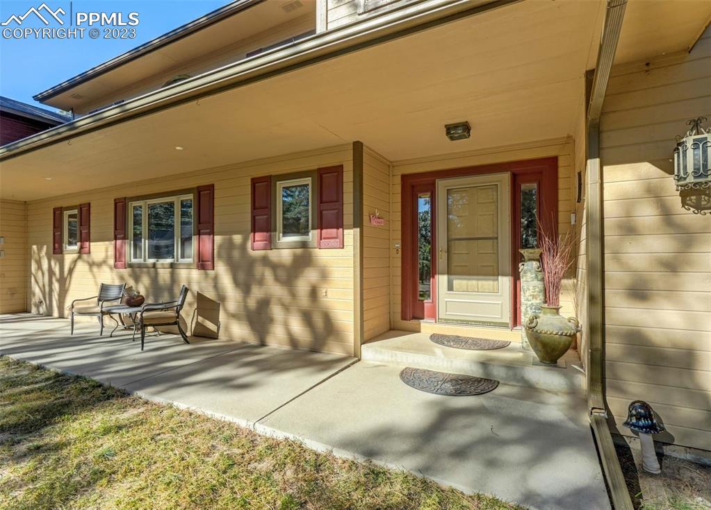 17305 Goshawk Road Colorado Springs, CO 80908 - Photo 4 of 50 a front view of a house