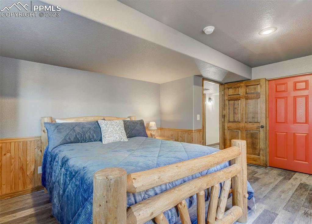 17305 Goshawk Road Colorado Springs, CO 80908 - Photo 46 of 50 a bed sitting in a bedroom next to a window