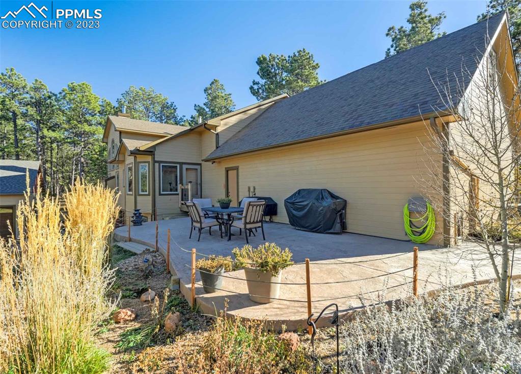 17305 Goshawk Road Colorado Springs, CO 80908 - Photo 6 of 50 a view of swimming pool with outdoor seating