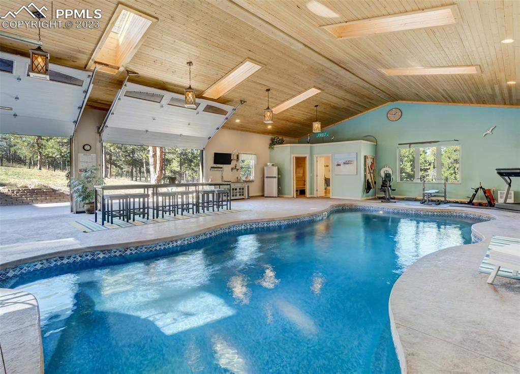 17305 Goshawk Road Colorado Springs, CO 80908 - Photo 10 of 50 a view of a living room and dining room