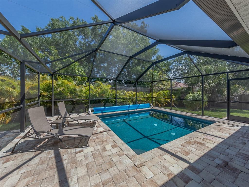 236 Holly Road Venice, FL 34293 - Photo 30 of 88 a view of swimming pool with a patio