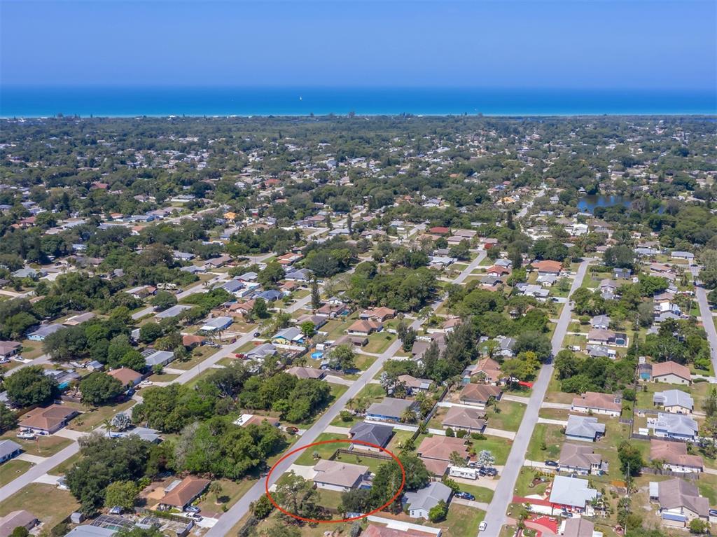 236 Holly Road Venice, FL 34293 - Photo 40 of 88 an aerial view of residential building with green space