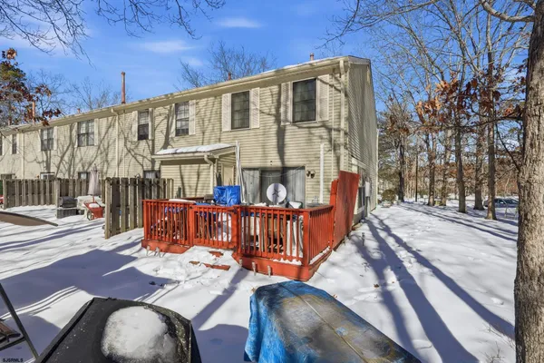 a view of a chairs and tables in patio