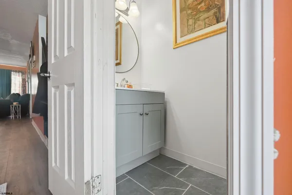 a bathroom with a toilet and a sink