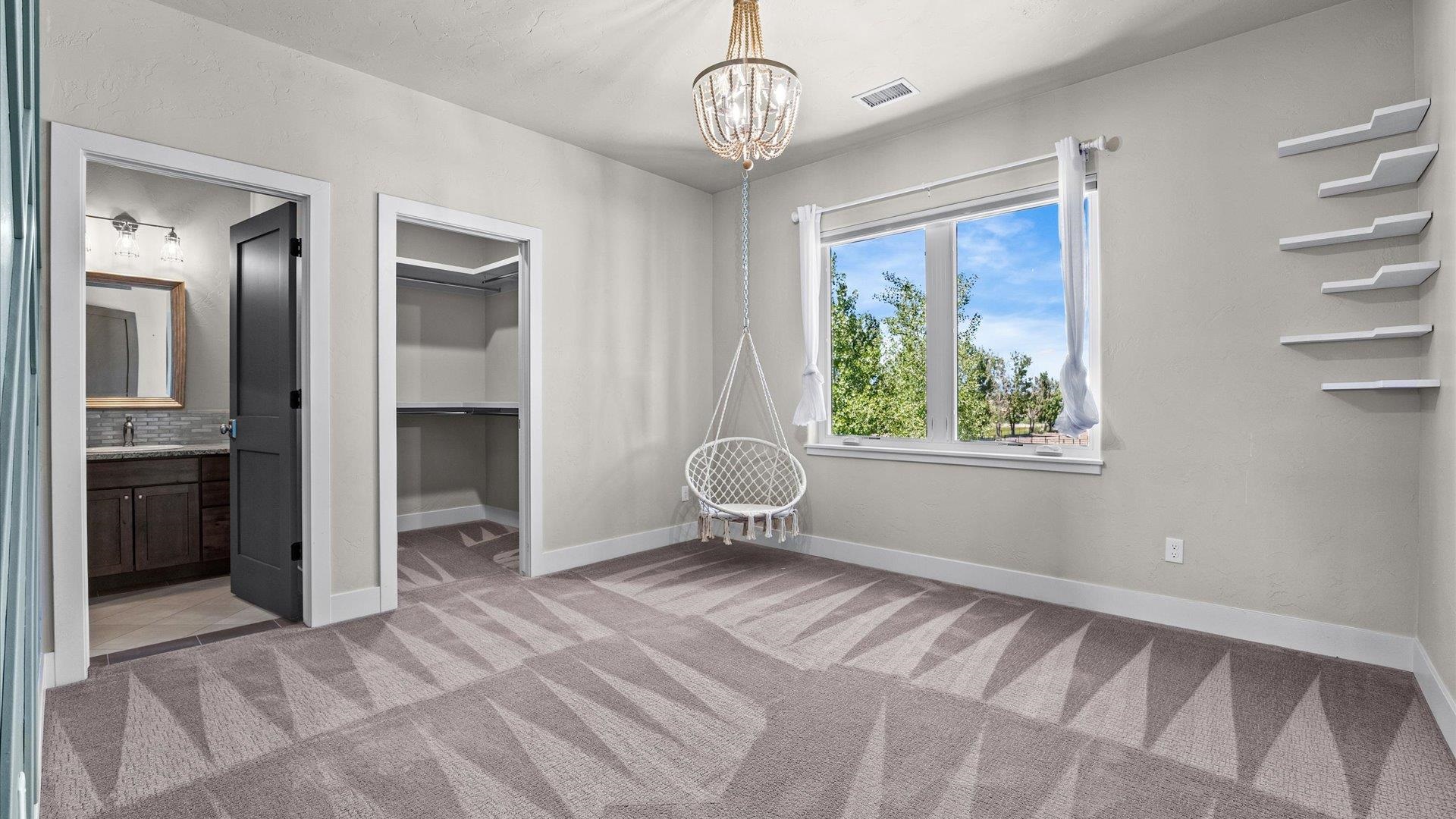 2041 J J 1/2 Road Fruita, CO 81521 - Photo 26 of 42 a view of an empty room with a window